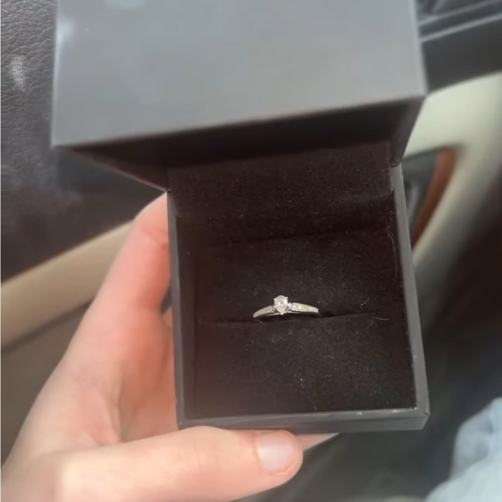 Elegant 10k white gold promise ring with 1/4 teardrop diamond!